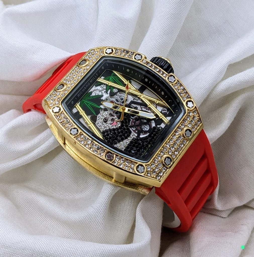Richard Mille Diamond Stone Watch – a timepiece that blends exquisite craftsmanship with the brilliance of diamond accents. This watch is designed for those who appreciate the finest things in life and want a watch that reflects their impeccable taste and love for elegance. Whether it’s for a special occasion, a formal gathering, or a statement piece for everyday wear, the Richard Mille Diamond Stone Watch is the perfect choice for discerning individuals. Genuine Diamond Stone Accents for Unmatched Luxury The standout feature of this watch is its stunning diamond stone embellishments, which elevate its design to new heights. Diamonds are known for their timeless beauty and rarity, and the inclusion of these precious stones adds a touch of opulence and exclusivity to this timepiece. These diamonds are carefully selected and expertly placed, ensuring that the watch exudes sophistication and allure. Whether you're attending a formal event or simply want to showcase your unique style, the diamond stone accents will undoubtedly make you the center of attention.